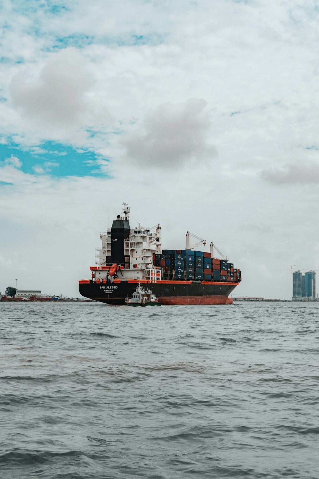Ship in ocean carrying containers